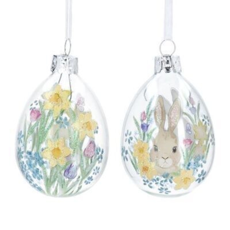 Clear glass egg shaped hanging decoration with daffodil floral and bunny design. The perfect addition to your home for Easter and Spring. 2 designs. By Gisela Graham.